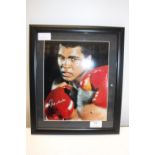 Photograph of and signed by Mohammed Ali