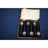 A cased set of hallmarked silver coffee spoons