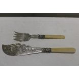 A silver plated fish knife and fork set