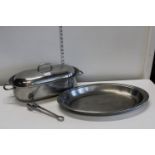 Two stainless steel kitchen items