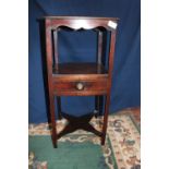 A vintage wooden plant stand with drawer. Postage unavailable