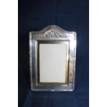 A hallmarked silver photo frame