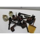 A job lot of vintage wooden smoking pipes and other smoking related items