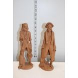 Two terracotta figures signed to the reverse