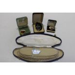 A selection of vintage costume jewellery and boxed set of pearls