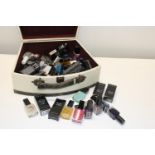 A large selection of Avon Cosmetics in a box