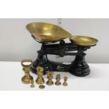 A set of vintage kitchen scales with brass weights Postage unavailable