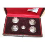 A cased set of white metal buttons