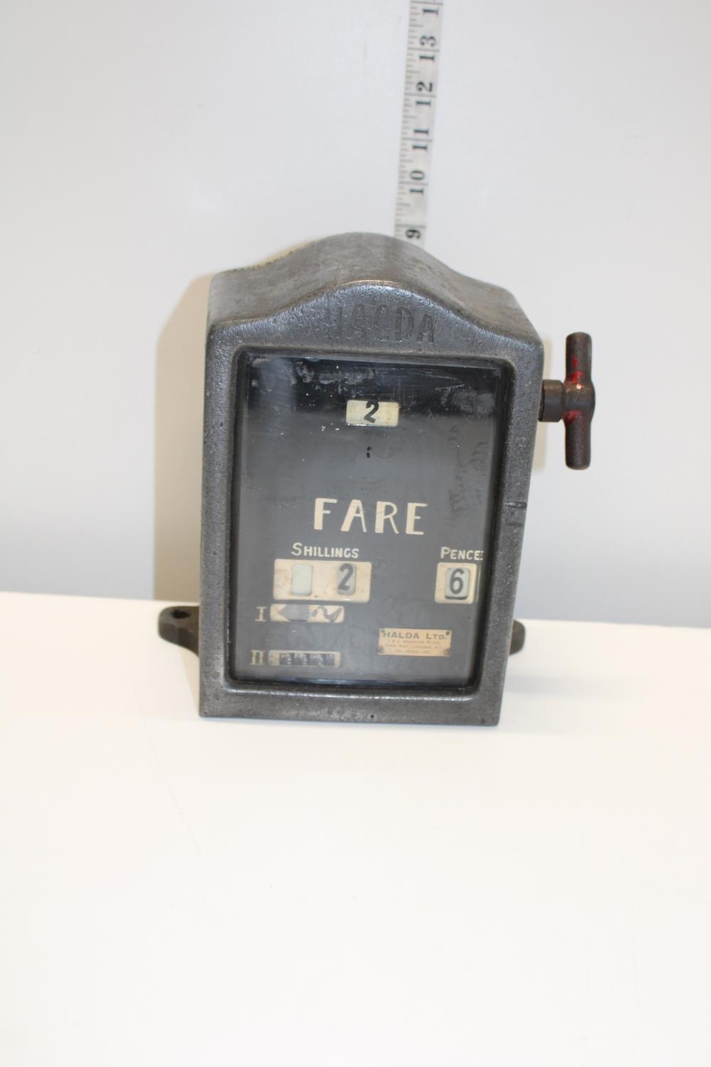 A vintage Halda Ltd 1930's taxi meter. Postage unavailable