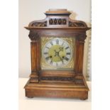 An oak cased mantle clock Postage unavailable
