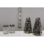 A pair of Mexican silver salt & Peppers and two small 925 silver topped salt & pepper pots