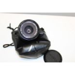 A Canon camera lens FD 35m 1:2.8