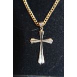 A 9ct gold cross and chain 18in long