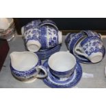 A vintage Old Willow blue and white tea service