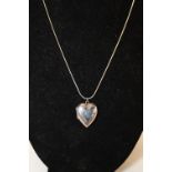 A 925 silver chain and heart locket