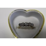A 18ct gold and platinum 3/4 ct diamond ring size O
