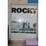 A large framed Rocky poster, shipping unavailable