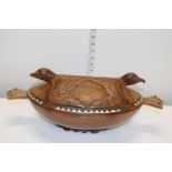 A novelty hand carved wooden bowl with lid