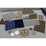 A mixed lot of collectable coins & stamps