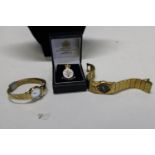 Selection of gold tone watches and army veteran badge