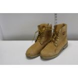 A pair of boots size 8.5
