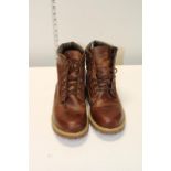 A pair of leather boots size 11.5