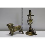 A heavy brass Bulldog and brass wall mounted lamp with gimble feature