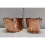 A pair of antique copper pots/planters