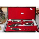 A vintage cased carving set