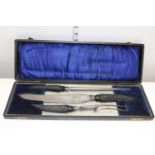 A antique cased carving set