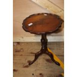 A vintage pie crust topped wine table. Postage unavailable
