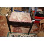 A Edwardian upholstered piano stool. Postage unavailable