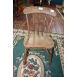 A antique child's elm chair. postage unavailable