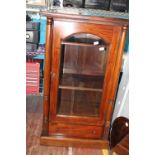 A quality mahogany two shelf display cabinet with under drawer & key. postage unavailable. Slight