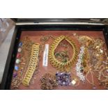 A display case & contents of costume jewellery