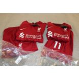 Two toddlers football shirts & shorts