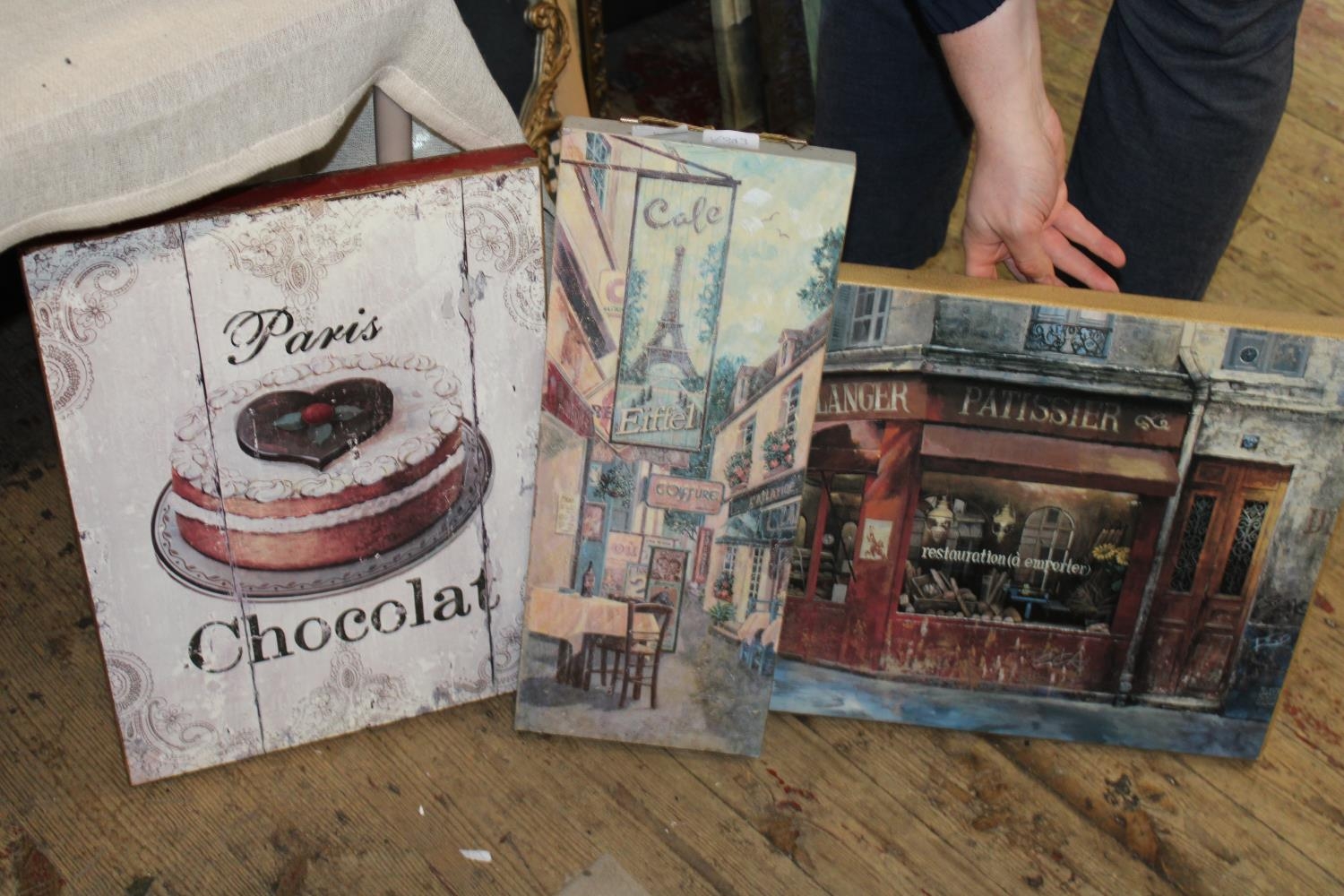 A selection of assorted French themed artwork