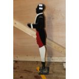 A tall vintage wooden figure. Postage unavailable