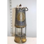 A vintage Eccles Miners lamp