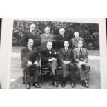 An original pressed photograph featuring Winston Churchill and other Politicians