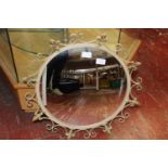 A vintage metal framed mirror. postage unavailable