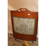 A vintage oak fire screen with silk thread decoration. postage unavailable