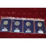 Four UNC collectable fifty pence coins