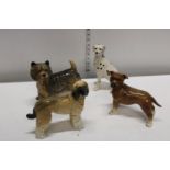 A selection of ceramic dog figures