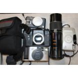 A selection of assorted cameras and lenses