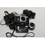 Selection of assorted camera bodies and lenses including Pentax