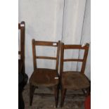 A small pair of child's wooden chairs Postage unavailable
