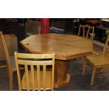 A hexagonal shaped wooden table and chairs. postage unavailable