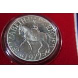 A silver 1977 Royal Mint commemorative crown
