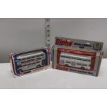 A dinky and Corgi boxed die-cast bus models